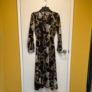 Elegant Black and Gold Patterned Dress